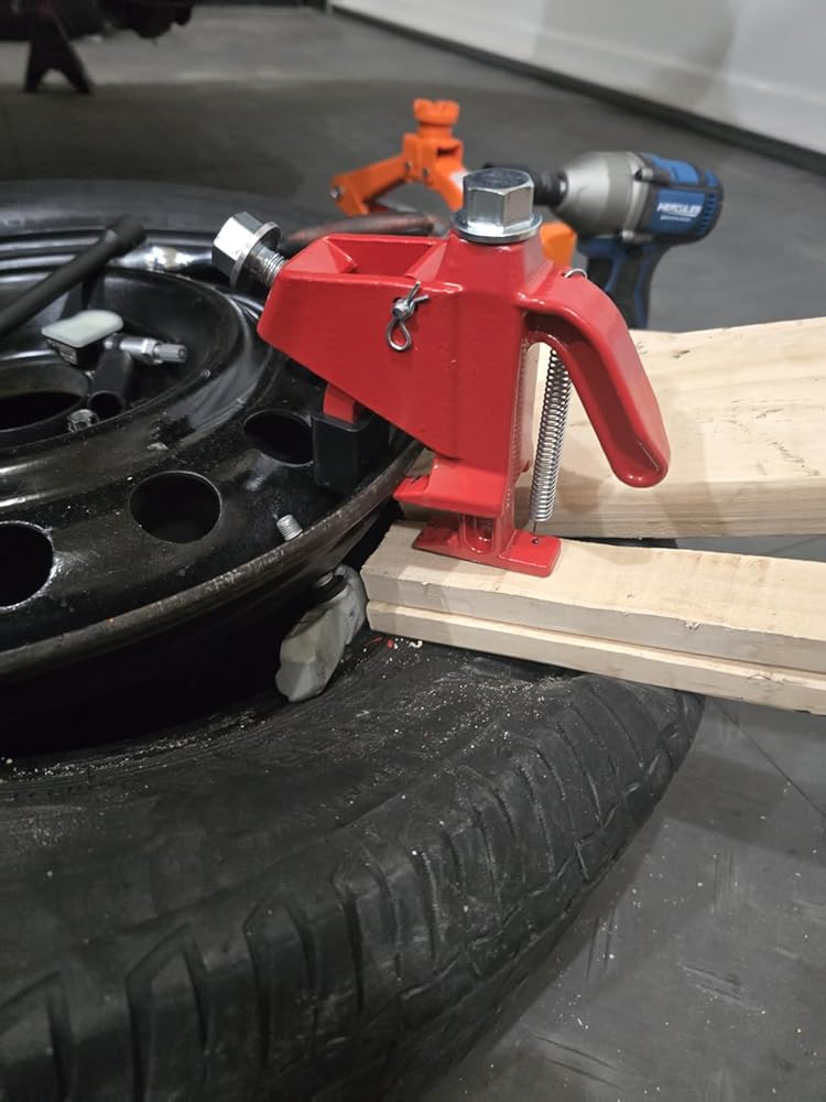 Rand A.'s BeadBuster XB-450i clamped to a wheel with an impact wrench